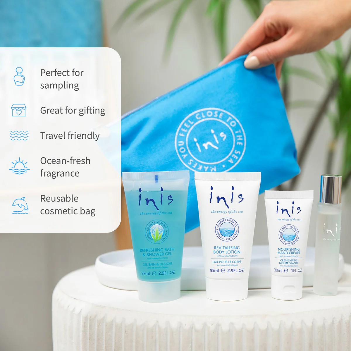 Inis Voyager Set four products displayed alongside blue branded cosmetic bag being held, with feature benefits listed
